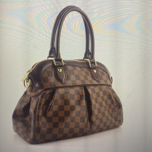 Louis Vitton Trevi Handbag Damien PM - Gently used. Come with cover bag.
